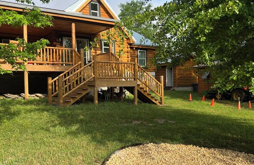 Wing Cabin | Rustic and Elegant Creekside Log Cabin