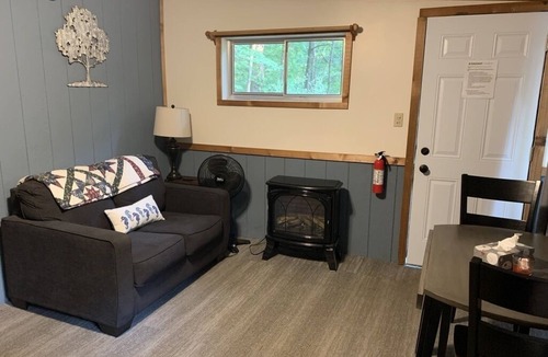 Sand Creek Cabin | Rustic cabins in secluded campground with lake access and woods to wander in.