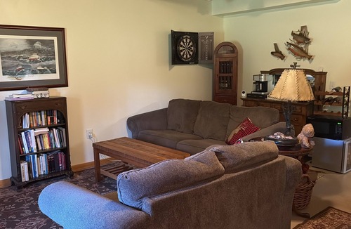 Gwinn House | Rustic Log Home Basement with Trail Access – Ideal Snowmobiler’s Winter Retreat