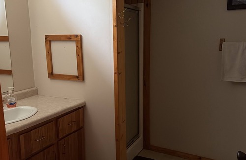 Gwinn House | Rustic Log Home Basement with Trail Access – Ideal Snowmobiler’s Winter Retreat