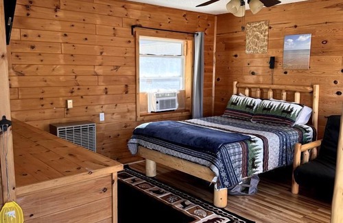 Millersburg Cabin | Rustic Luxury with Pets: Pet-Friendly Glamping in Ocqueoc Township, Michigan