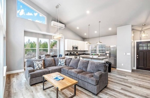 Sandpoint House | Secluded home with deck, grill, hot tub, fireplace, private beach, & W/D