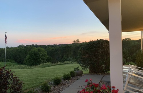 Honey Creek House | Secluded, spacious, hilltop acreage home with stunning views of Omaha skyline
