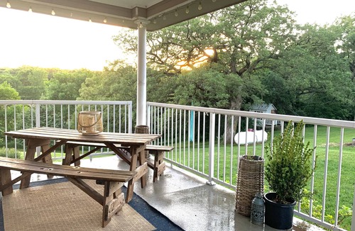 Honey Creek House | Secluded, spacious, hilltop acreage home with stunning views of Omaha skyline