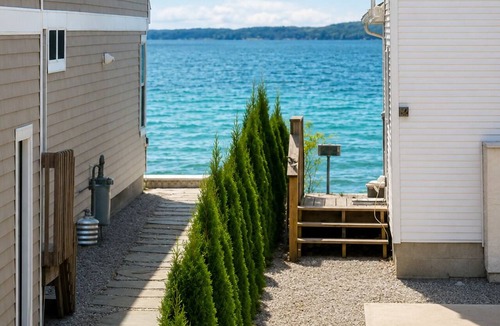 Beulah Apartment | Second floor unit close to downtown Beulah & Crystal Lake for year-round fun!