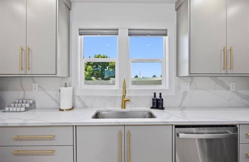 Burley House | Sleek modern design meets peaceful retreat for a comfortable stay.