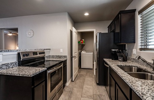 Kingman House | Sleek & Modern Triplex | Private Yard & Top Amenities