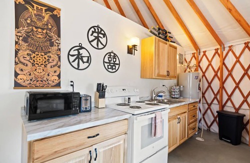 Lava Hot Springs RV Rental | Sleeps up to 30 people-Family Retreat! 5 Themed Yurts!