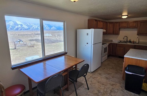 Auburn House | Snowmobilers' Paradise! Large home, 1 acre, spacious parking, close to trails.