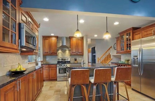 Carol Stream House | Spacious Chicagoland Retreat with Hot Tub + Fireplace Sleeps 8+