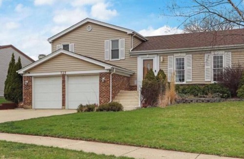 Carol Stream House | Spacious Chicagoland Retreat with Hot Tub + Fireplace Sleeps 8+