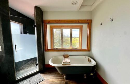 Tetonia House | Spacious Farmhouse Estate with Mountain Views & Dual Kitchens near Skiing and Trails in Tetonia, Idaho