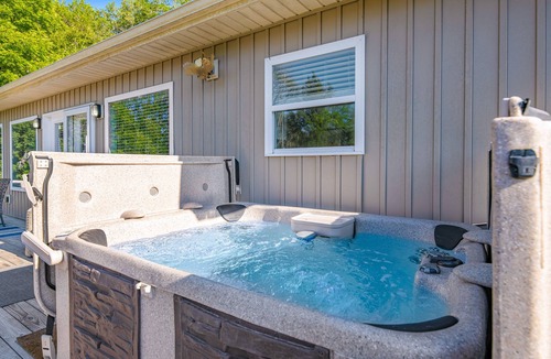 Maynardville House | Spacious, lakefront home with private dock, hot tub, chic decor, & amazing views