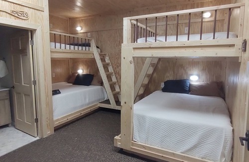 Waubay Cabin | Spacious lodge with custom bunk rooms in prime Lake Area with ample parking.