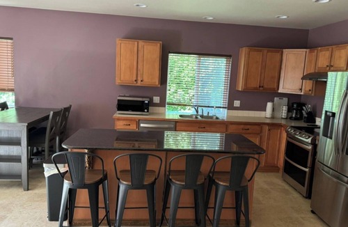 South Hill House | Spacious Puyallup Home with Hot Tub, Game Room & EV Charger Near JBLM