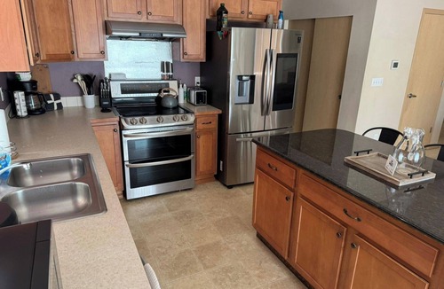 South Hill House | Spacious Puyallup Home with Hot Tub, Game Room & EV Charger Near JBLM