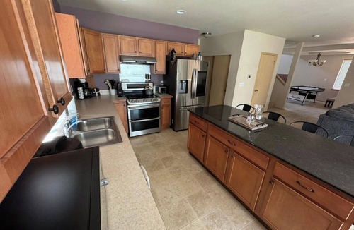 South Hill House | Spacious Puyallup Home with Hot Tub, Game Room & EV Charger Near JBLM