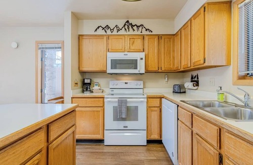 Jackson House | Spacious townhouse with ski & mountain views, deck, grill, & fireplace