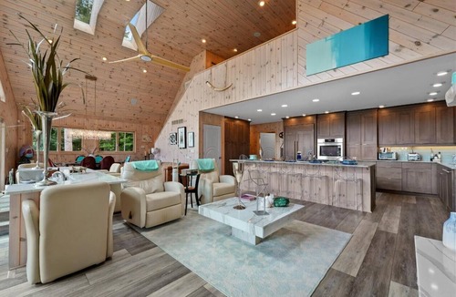 Higgins Lake House | STEPS 2 HIGGINS LAKE on LAKEFRONT PROPERTY w BEACH!