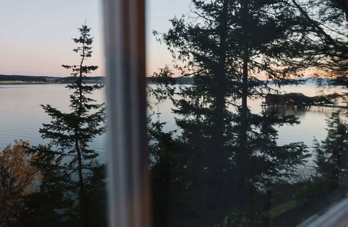 Coupeville House | Storybook family cottage perched atop Penn Cove