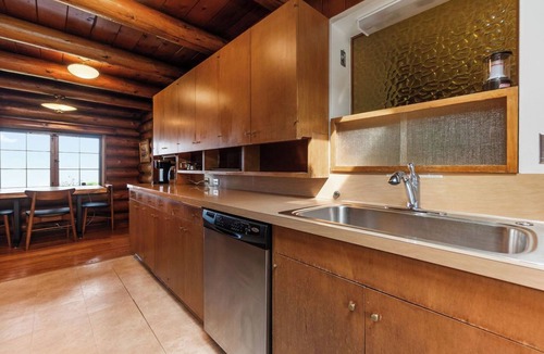 Lawton Park House | Storybook Log House with Waterfront and Fireplace