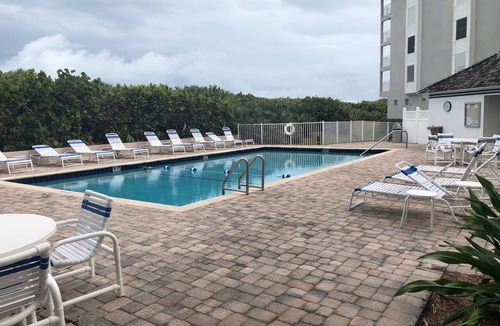 Stuart Condo | Stunning Oceanfront View 2BR Heated Pool steps to Beach & Tiki Bar Resort Access
