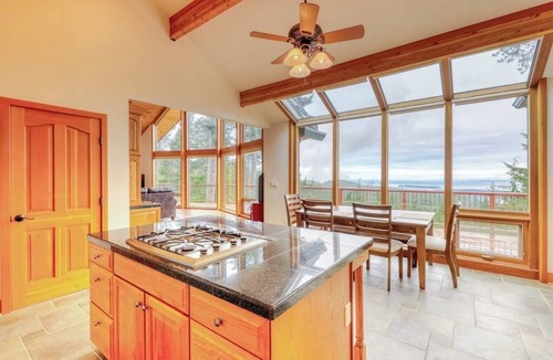 Olga House | Stunning Water View Retreat with Fireplace, Huge Deck, and Jetted Tub