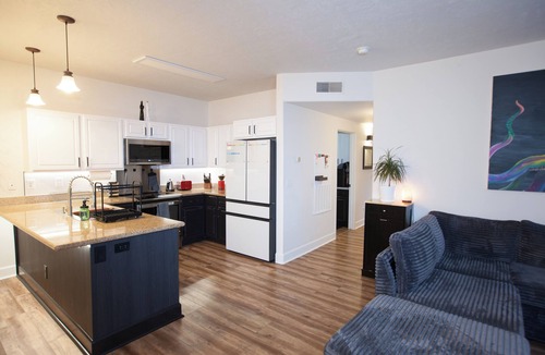 Coeur d'Alene Condo | Stylish 3-bed, 2-bath modern condo in Coeur d'Alene, perfect for up to 6 guests. Enjoy a fully equipped kitchen, king suite, and community sauna & gym. located just 12 mins from downtown, 20 mins to Silverwood Theme Park, and 40 mins to Spokane!