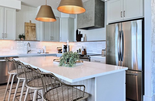 Sandpoint House | Stylish Waterfront Retreat, 100’ Private Yard and Beach + Panoramic Water Views