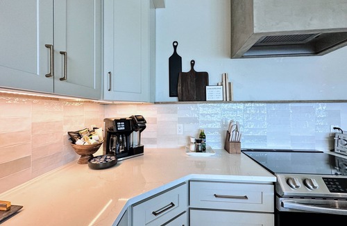 Sandpoint House | Stylish Waterfront Retreat, 100’ Private Yard and Beach + Panoramic Water Views
