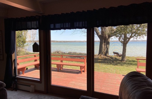 Mullett Lake House | Sunrise on Mullett Lake, 115' Lakefront sandy bottom, private dock, new remodel