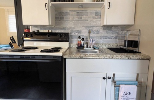 Prudenville Apartment | Sunset Studio #8 at Lake Day Cabins