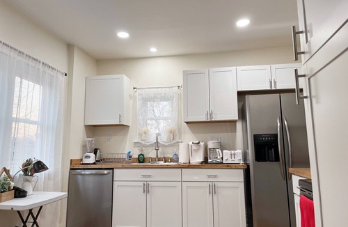 Clinton Township Bed & Breakfast | Super Cute & Dreamy Home With 65”TV, AC, Grill and everything