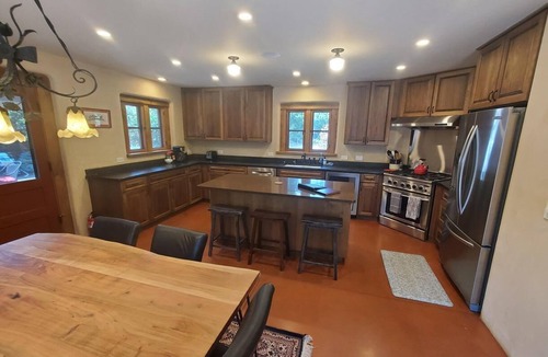 Bozeman House | This deluxe Spanish-style 4-bedroom home offers the best of Bozeman!