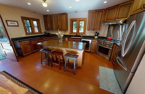Bozeman House | This deluxe Spanish-style 4-bedroom home offers the best of Bozeman!