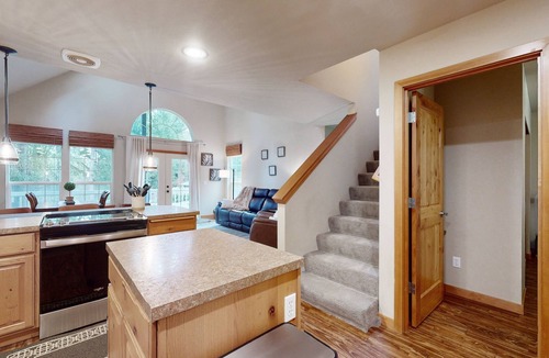 Anderson Island House | Tree-lined Anderson Island home with porch & fenced yard, near dock/tennis