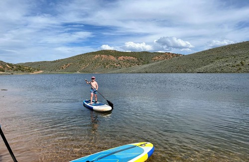 Laketown RV Rental | Unplug and unwind in our secluded off-grid glamping dome, nestled by a private lake. Enjoy the peace and quiet with all the comforts of home.