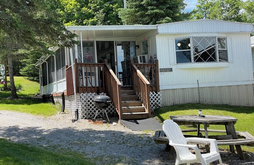 Herron House | Vacation Stay at Hubbard Lake Air-Conditioned Lakefront Mobile Home