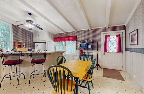 Cashes Valley Cabin | Waterfront cabin in a peaceful location w/private hot tub - dog-friendly