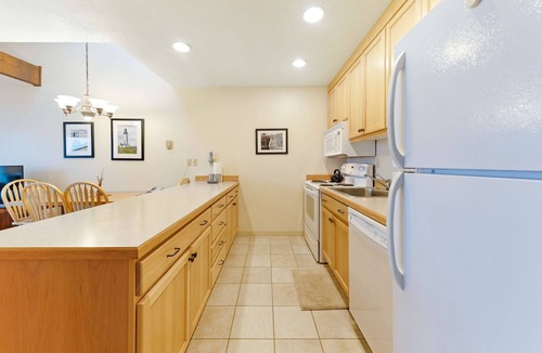 Historic Bayfront Condo | Waterfront Condo with Private Deck, Bay Views, Pool, Hot Tub, & Sauna