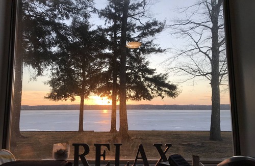 Traverse City Cottage | Waterfront directly on Lake Leelanau!Cottage with beach and fire pits!