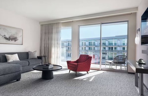 Ivins Hotel | Welcoming Desert Room Offering Stunning Views & Refreshing Outdoor Pool