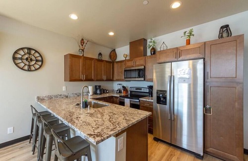 Valley House | Wonderful Triplex Unit With Spectacular Lake View!