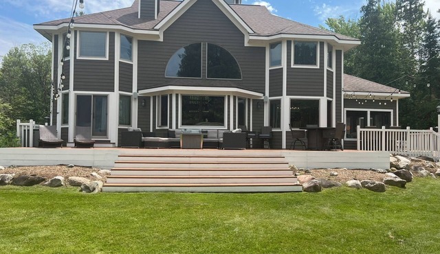Amazing 6-bedroom, 5K sq. ft, one acre secluded Mullett Lake Beachfront Home
