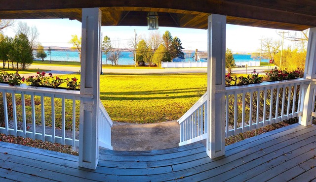 Beachfront home w/dock on Portage Lk. 4 miles to Lk Michigan beach. 4 bdrms.