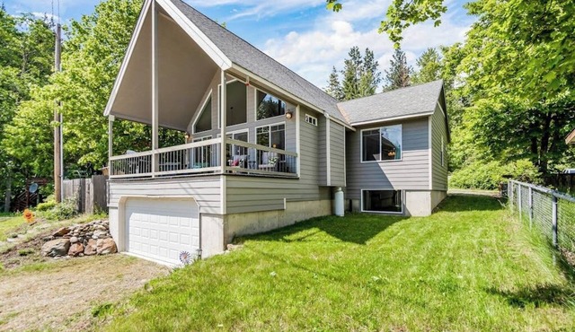 Beautiful 3-story home with lake/bay views, deck, grill, firepit & fireplace