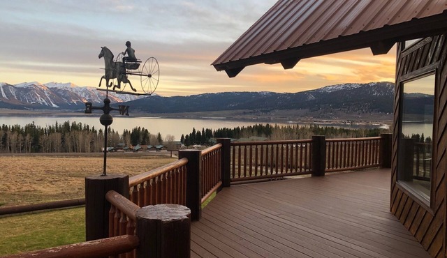 BEAUTIFUL 5 STAR LOG HOME ON 15 ACRES! LAKE VIEWS, STOCKED POND, CLOSE TO YNP!