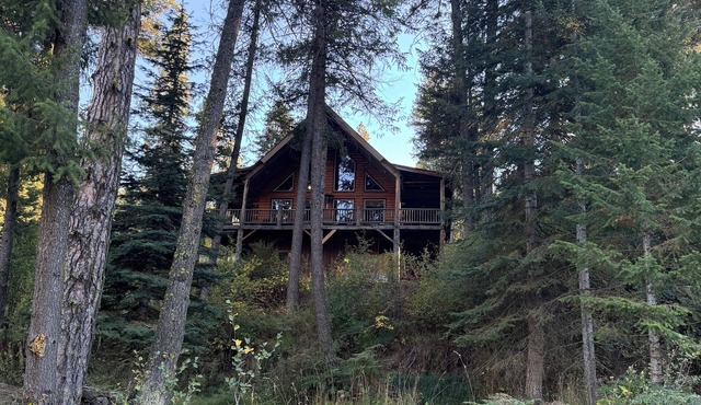 Beautiful log cabin vast deck looking over the 12th fairway of Terrace Lakes GC