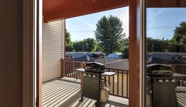 Bright, airy, contemporary row home located in Orchard Home