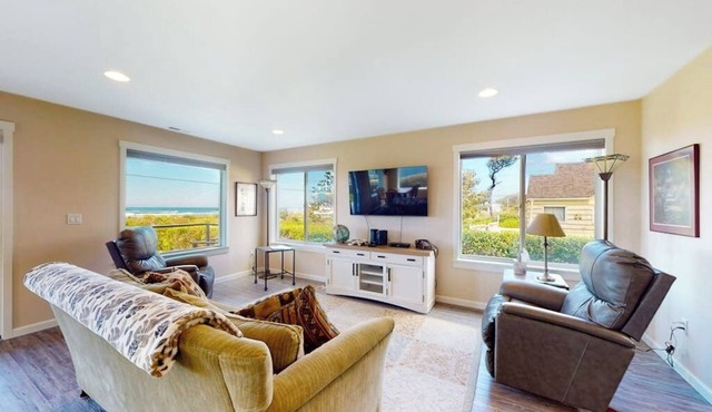 Bright, modern home with great ocean views & deck - walk to the beach